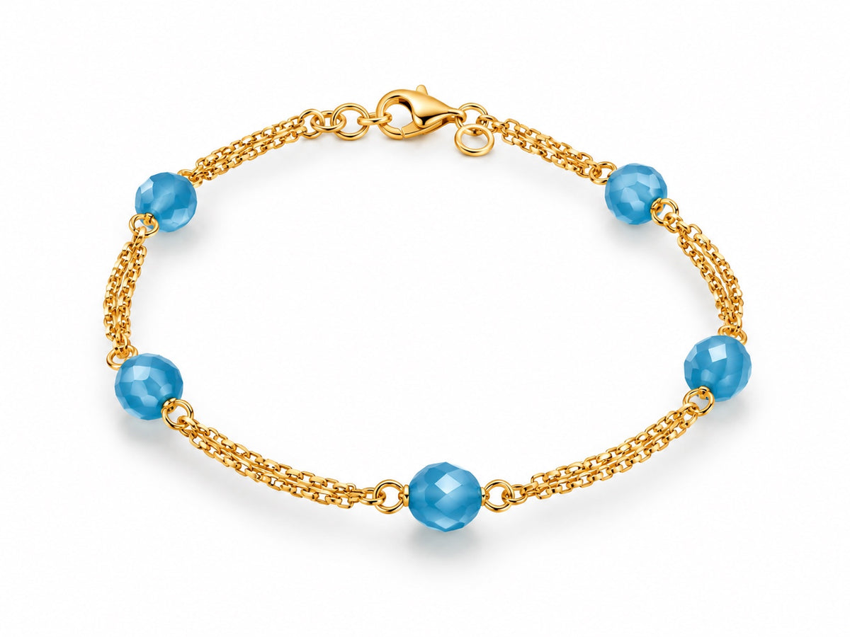 21 Karat Goldarmband mit blauen facettierten Steinen, 18 cm
